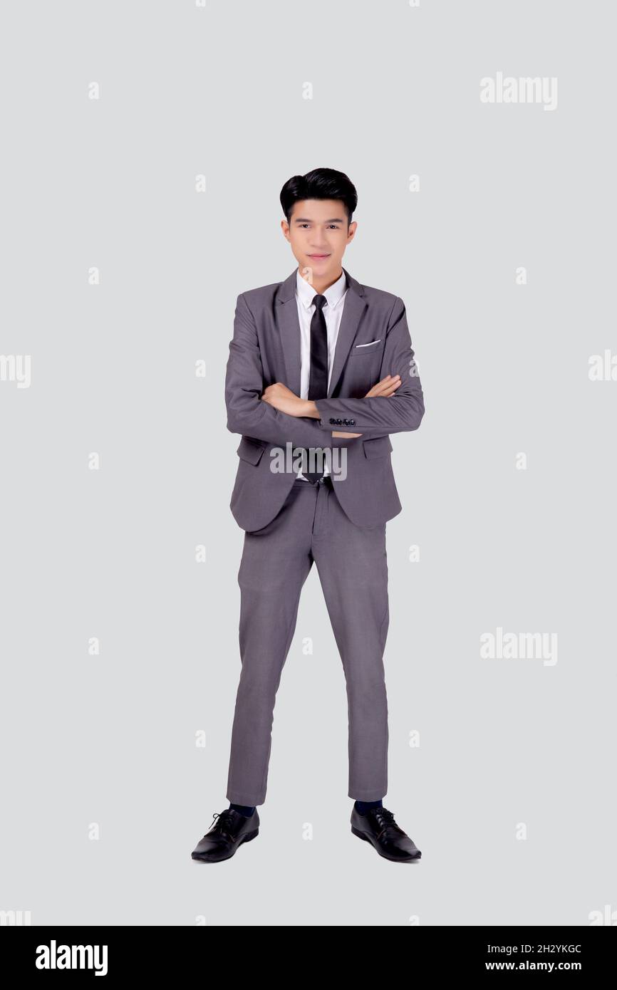 Full length portrait businessman in suit with crossed his arms standing ...