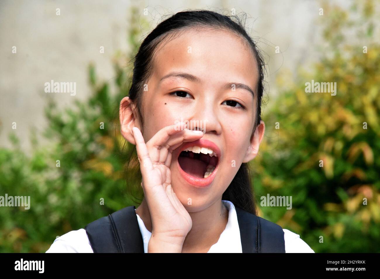 Student Teenager School Girl Yelling With School Books Stock Photo