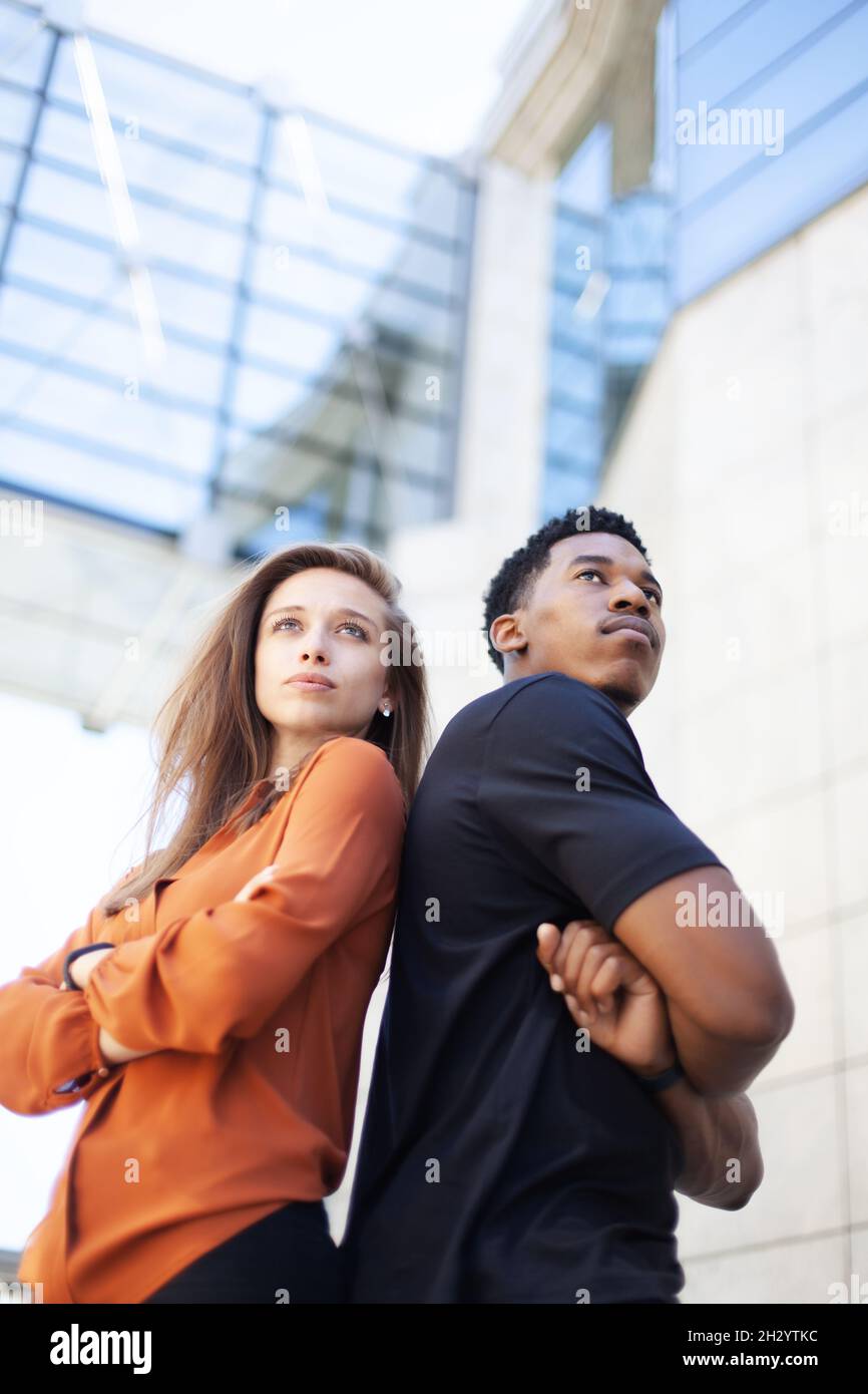 successful business couple standing in front of office center Stock ...