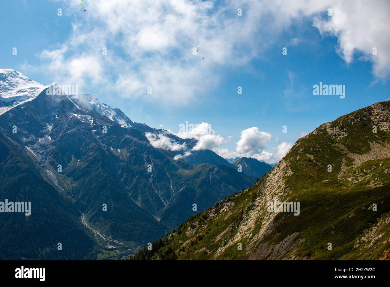 The view from a hiking trail between Refuge de Bellachat and Les Houches (near Chamonix) towards the Massif du Mont Blanc. September 2021 Stock Photo
