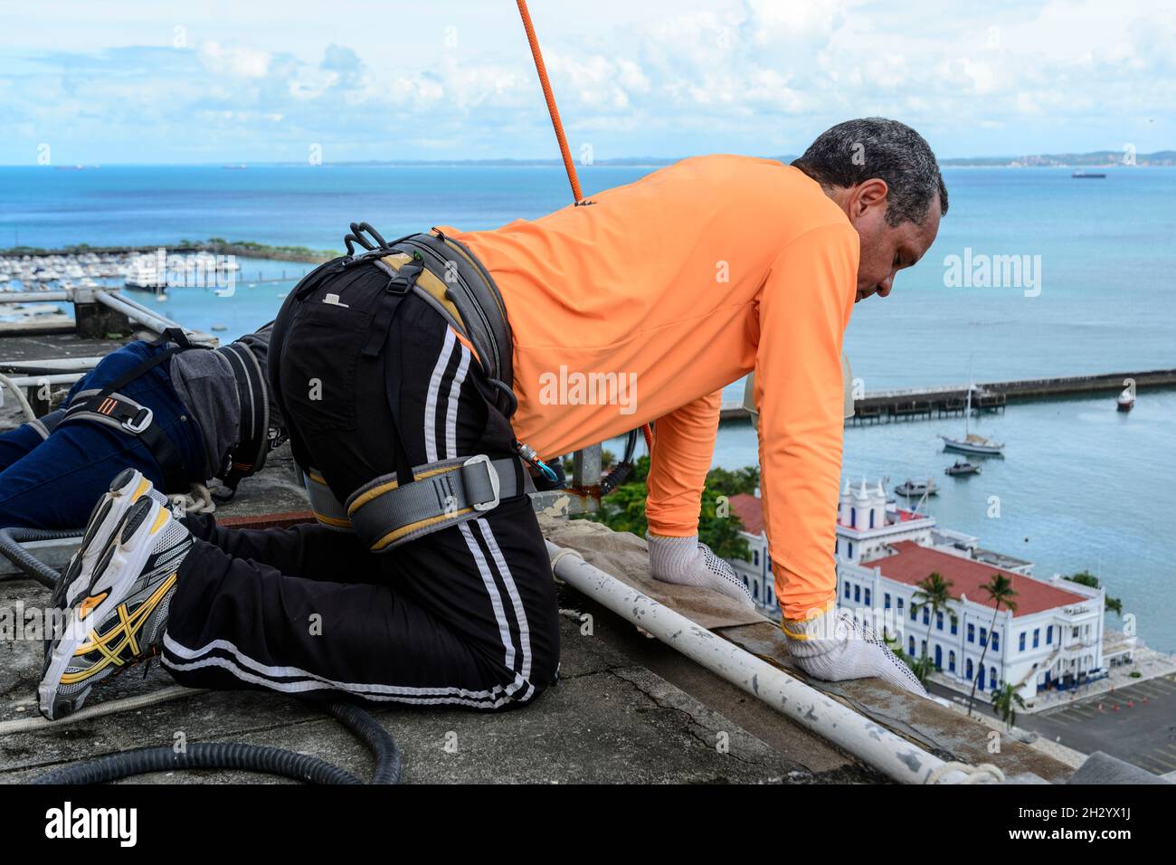 Salvador, Bahia, Brazil - March 12, 2017: Man preparing to practice Rappel on Elevador Lacerda, the postcard of Salvador, Bahia, Brazil. Stock Photo