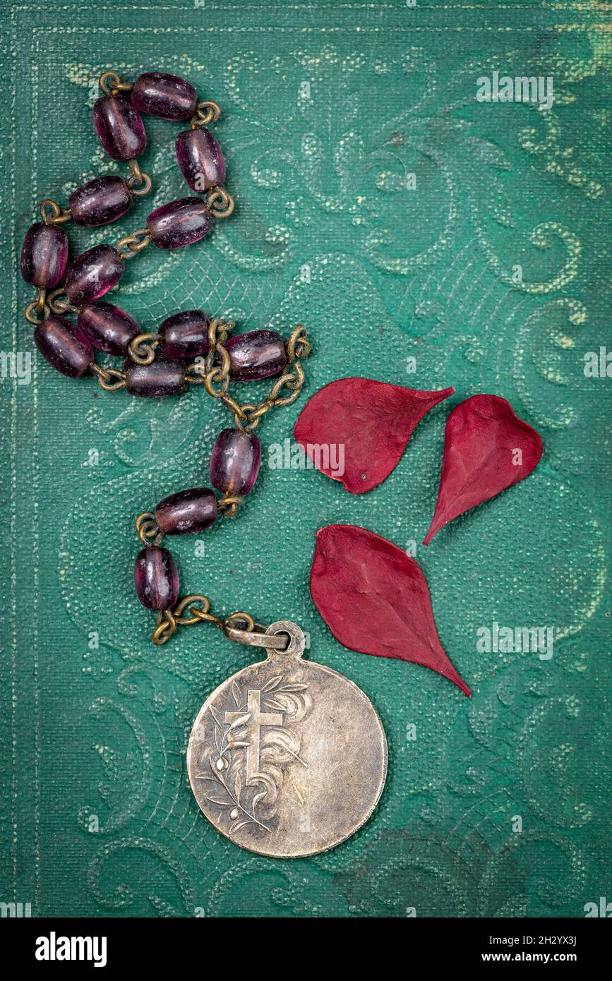 Old Rosary stored with other contents from a Korean War Soldiers pocket pocket Stock Photo