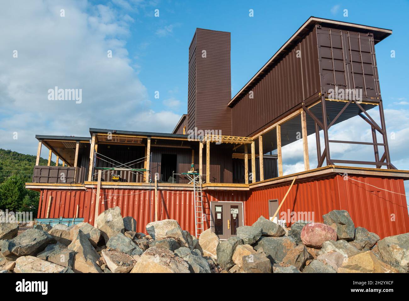 Newfoundland, Canada-October 2021: The exterior construction of a hotel using shipping containers as modular construction. Stock Photo