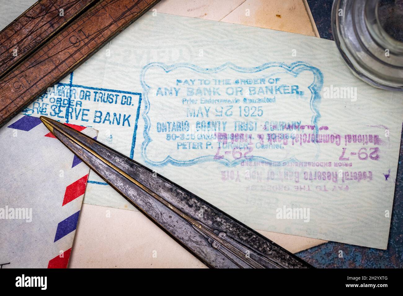 Cancel Stamps on the back of an antique check shows payment made in