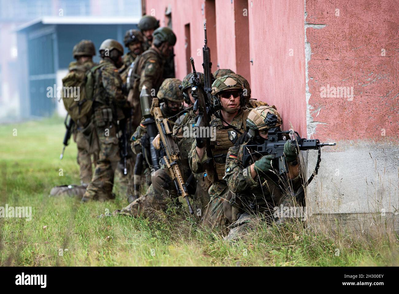 Soldiers from the Rapid Response Forces Division provide security while ...