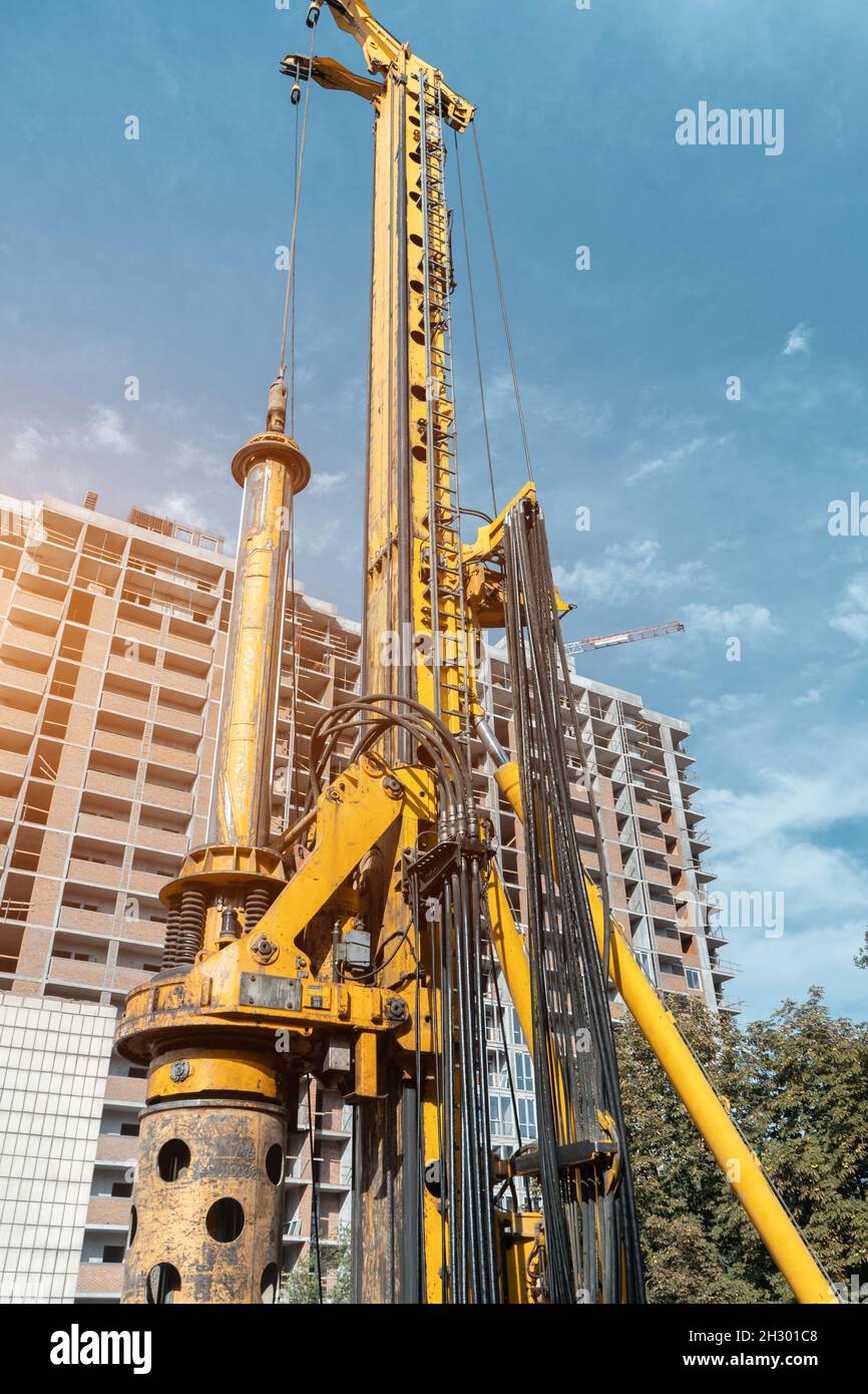 pile driver heavy machinery for concrete pouring at constructions Stock Photo