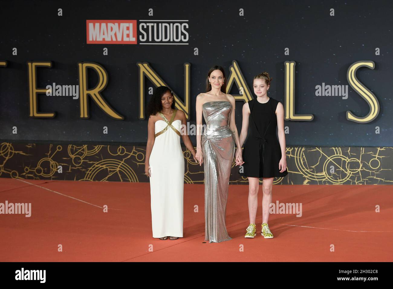Rome, Italy. 24th Oct, 2021. Zahara Marley Jolie-Pitt, Angelina Jolie and Shiloh Jolie-Pitt attend the red carpet of the movie Eternals at the Auditorium Parco della Musica. (Photo by Mario Cartelli/SOPA Images/Sipa USA) Credit: Sipa USA/Alamy Live News Stock Photo
