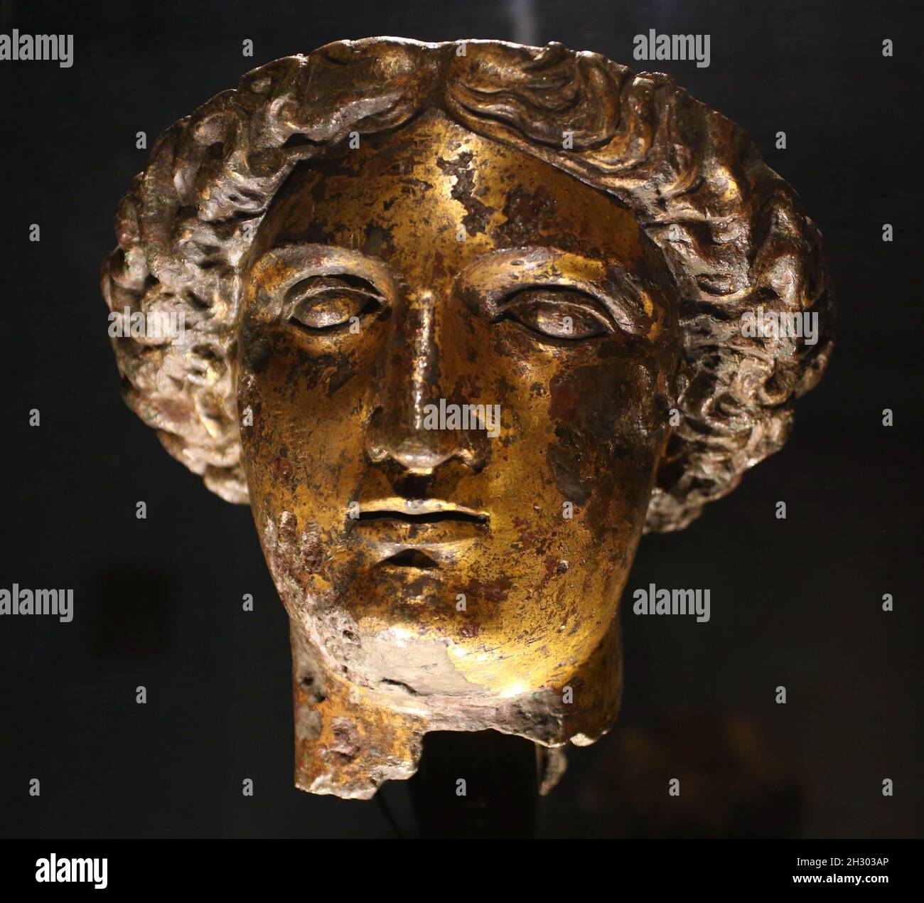 Closeup shot of a bronze statue of a Greek goddess in a museum Stock Photo