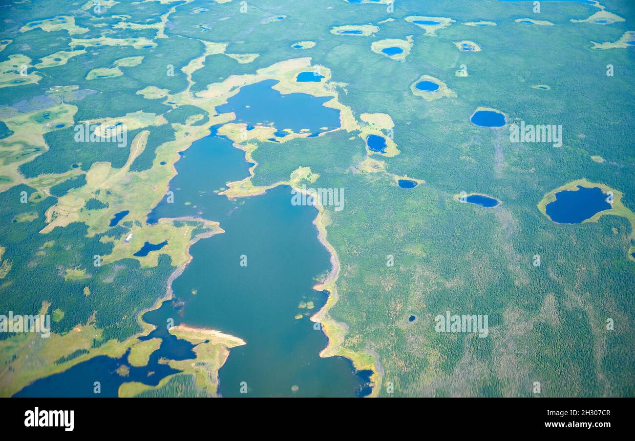 Aerial view on North Yakutia taiga and tundra landscapes from  airplane Stock Photo