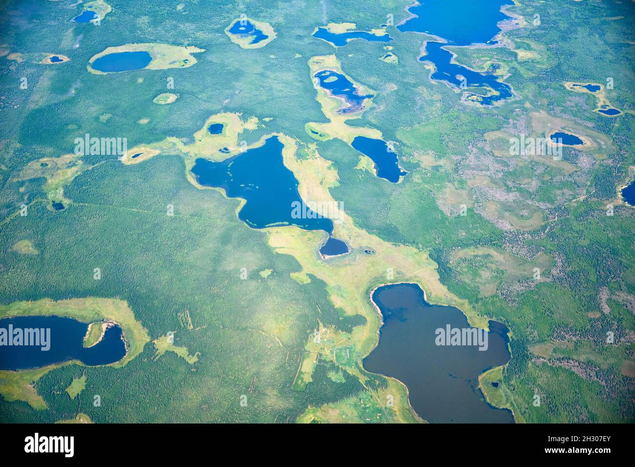 Aerial view on North Yakutia taiga and tundra landscapes from  airplane Stock Photo