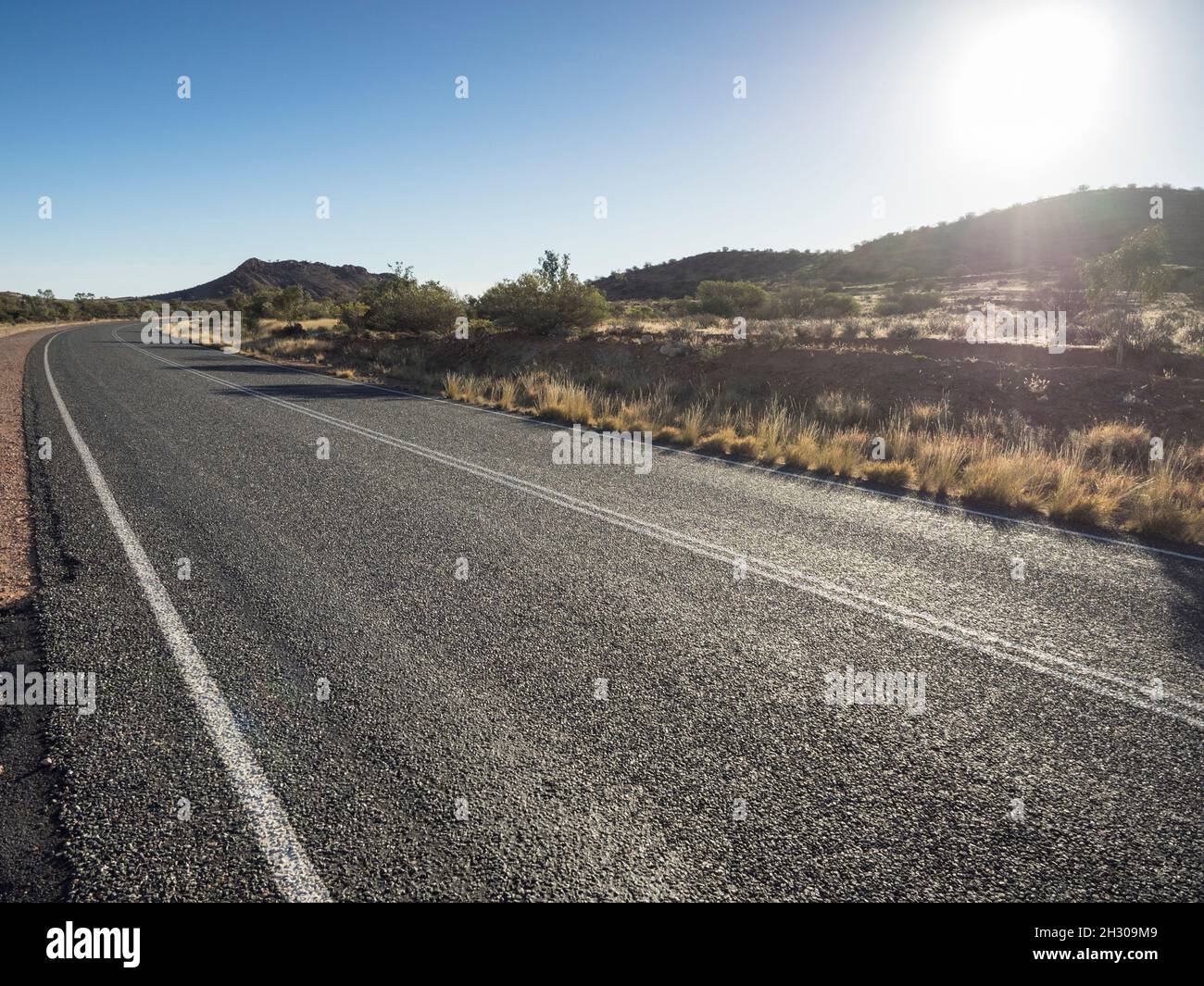Stuart Highway near Mt Breaden, south of Alice Springs, Central Australia Stock Photo