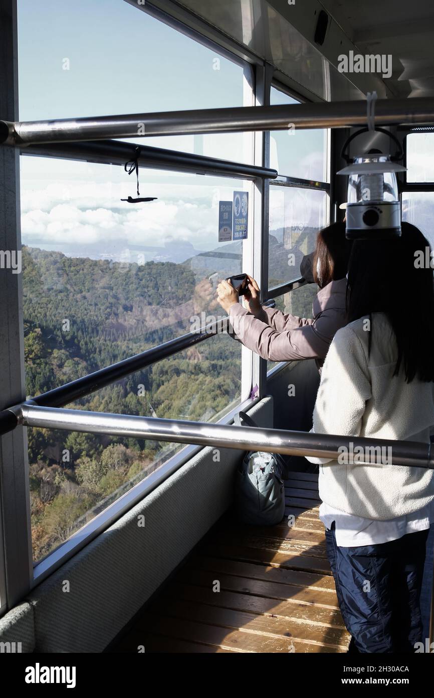 Ryuoo Ropeway Nagano, Japan, 2021-22-10 , Peoples inside the gondola at the sora ...