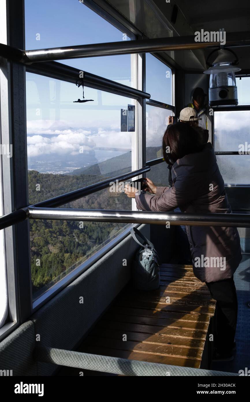 Ryuoo Ropeway Nagano, Japan, 2021-22-10 , Peoples inside the gondola at the sora ...