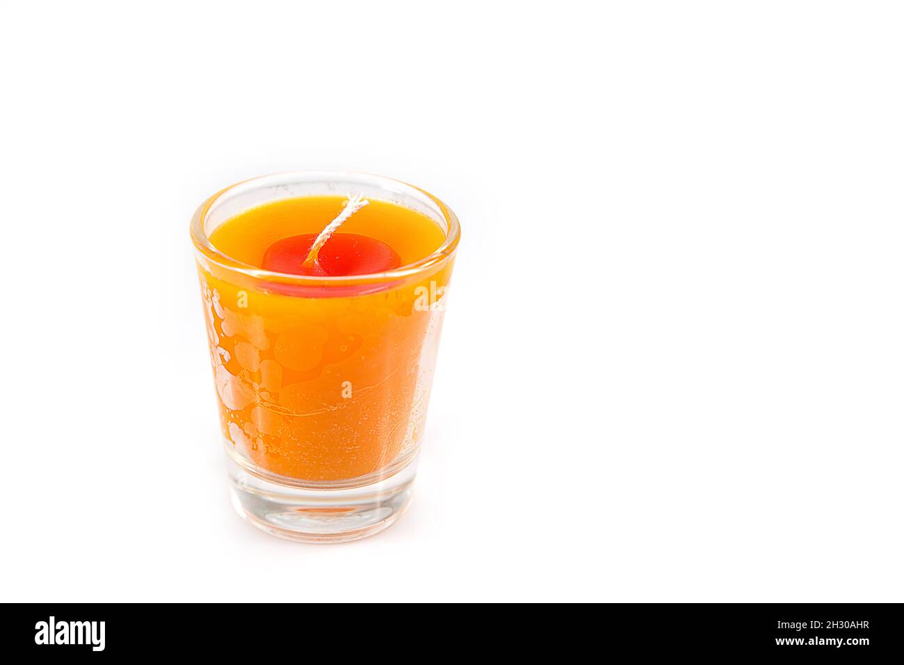 Aroma orange candle in glass isolated on white background Stock Photo Alamy