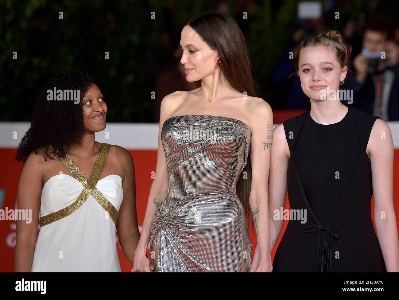 Rome, Italy. 24th Oct, 2021. ROME, ITALY - OCTOBER 24 Zahara Marley Jolie-Pitt, Angelina Jolie, Shiloh Jolie-Pitt, attends the red carpet of the movie 'Eternals' during the 16th Rome Film Fest 2021 on October 24, 2021 in Rome, Italy. Credit: dpa/Alamy Live News Stock Photo