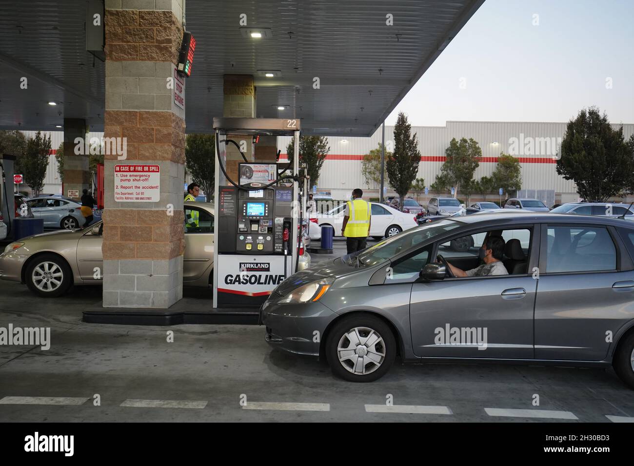 California, United States. 16th Oct, 2021. A driver pump gas at a gas