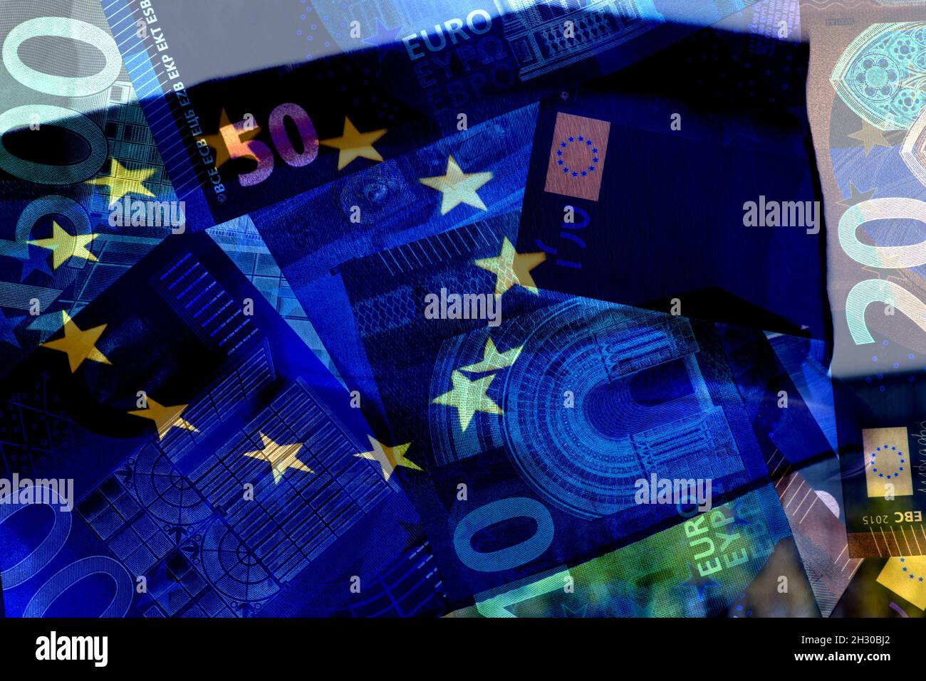 European Union flag and euro banknotes Stock Photo
