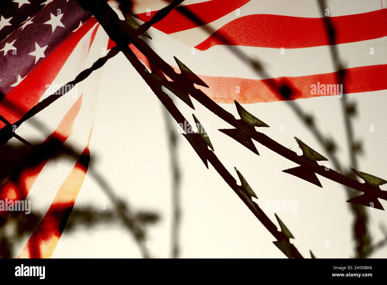 United States flag and barbed wire Stock Photo Alamy