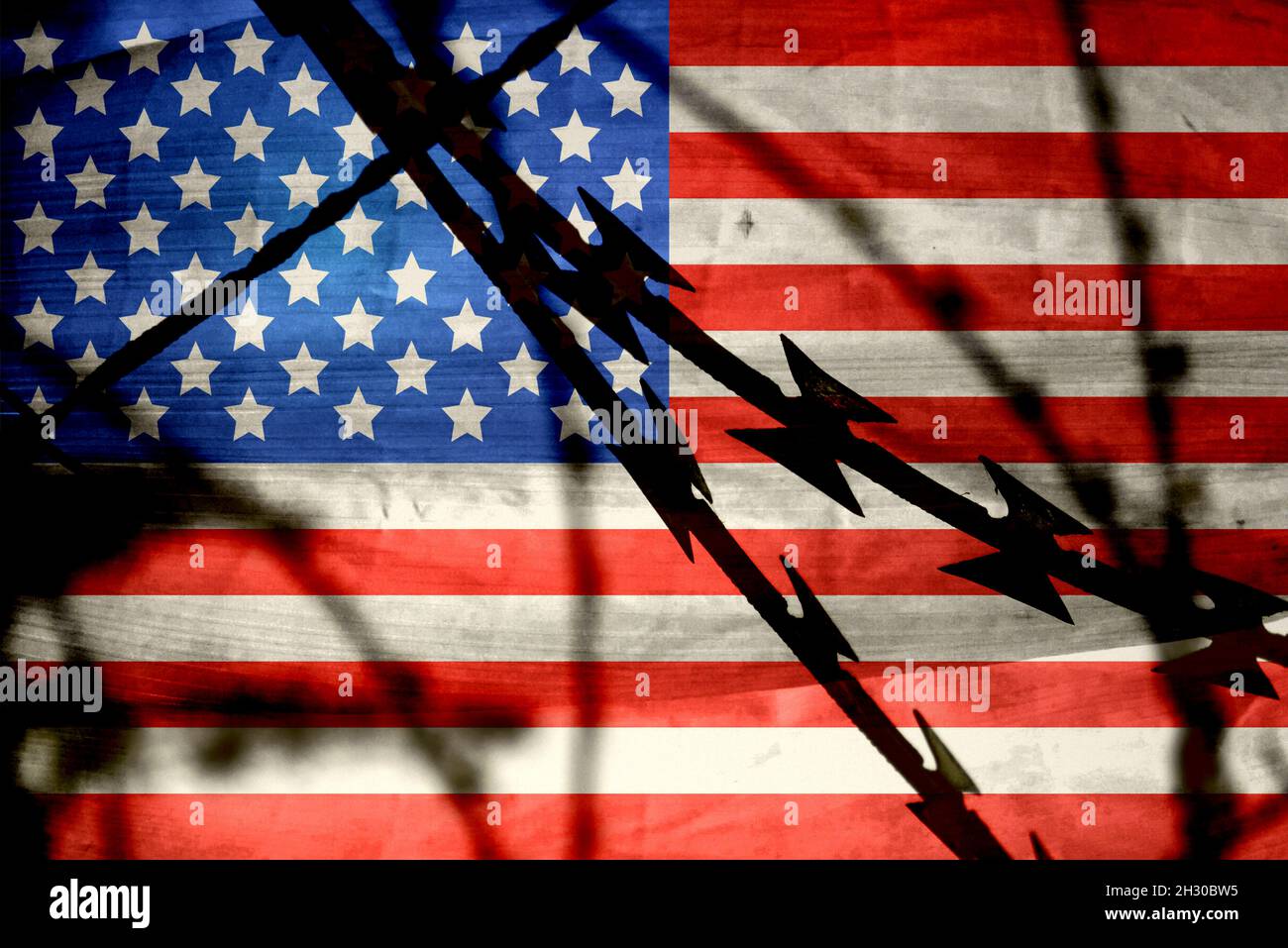 Flag of USA and barbed wire Stock Photo Alamy
