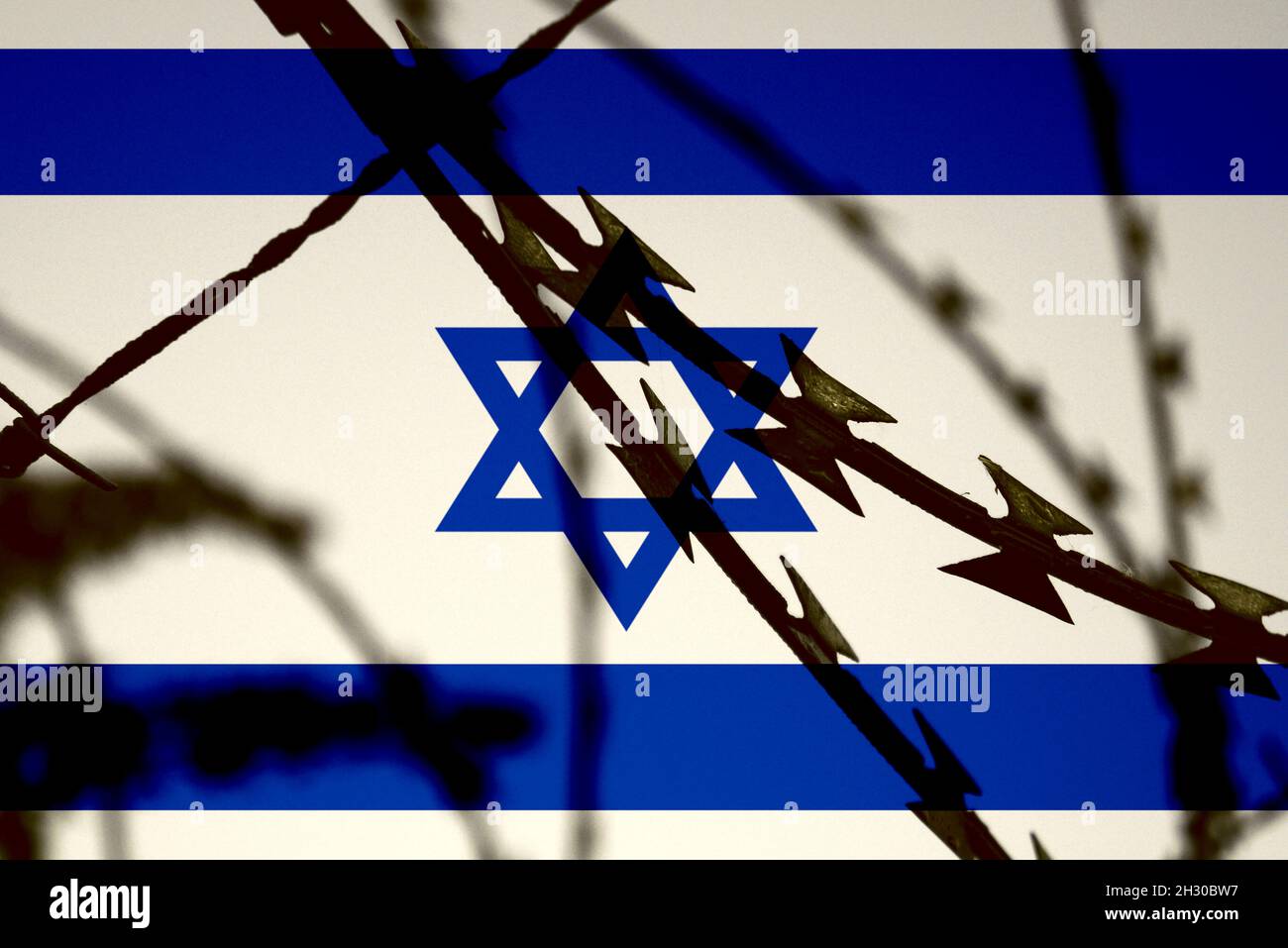 Flag of Israel and barbed wire Stock Photo