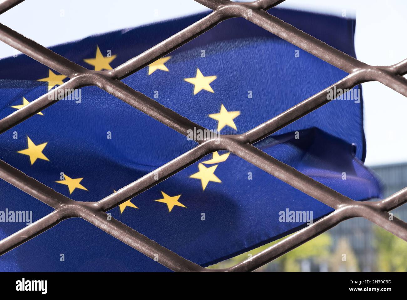 Flag of the European Union and a fence Stock Photo