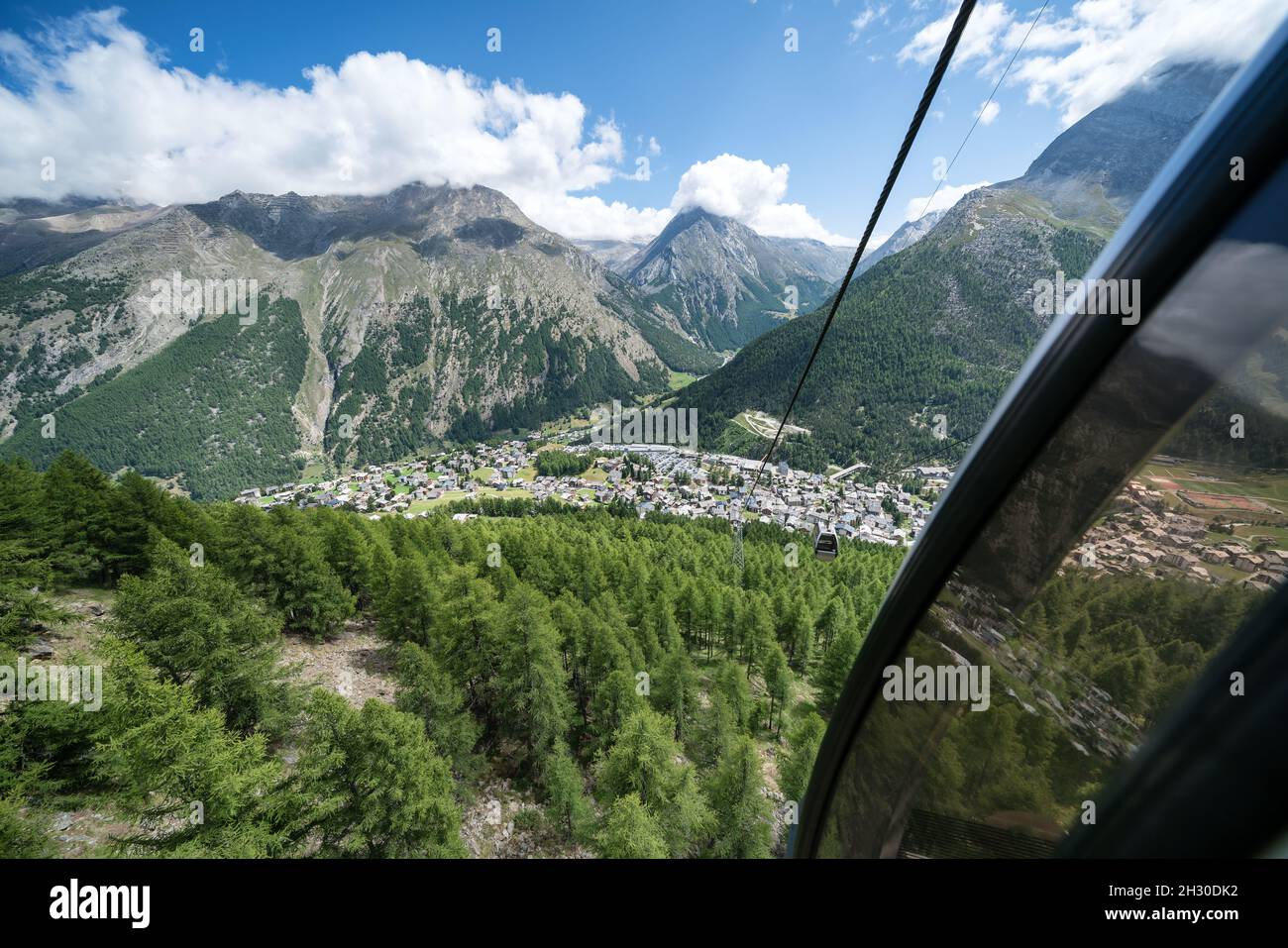 Looking over Saas-Fee city from a ski lift, Switzerland Stock Photo