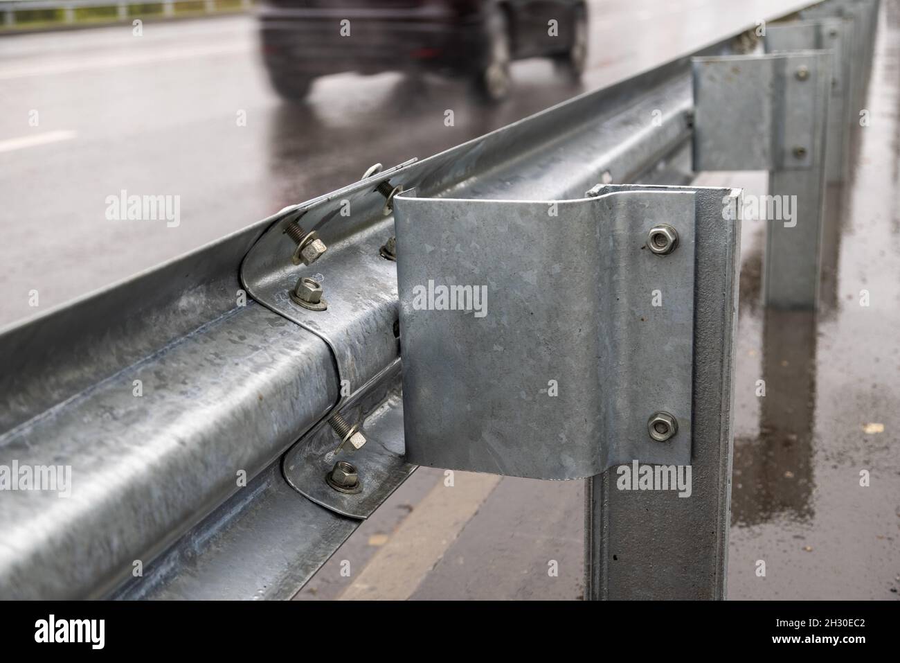 underscrewed nuts and bolts in highway road railing Stock Photo Alamy