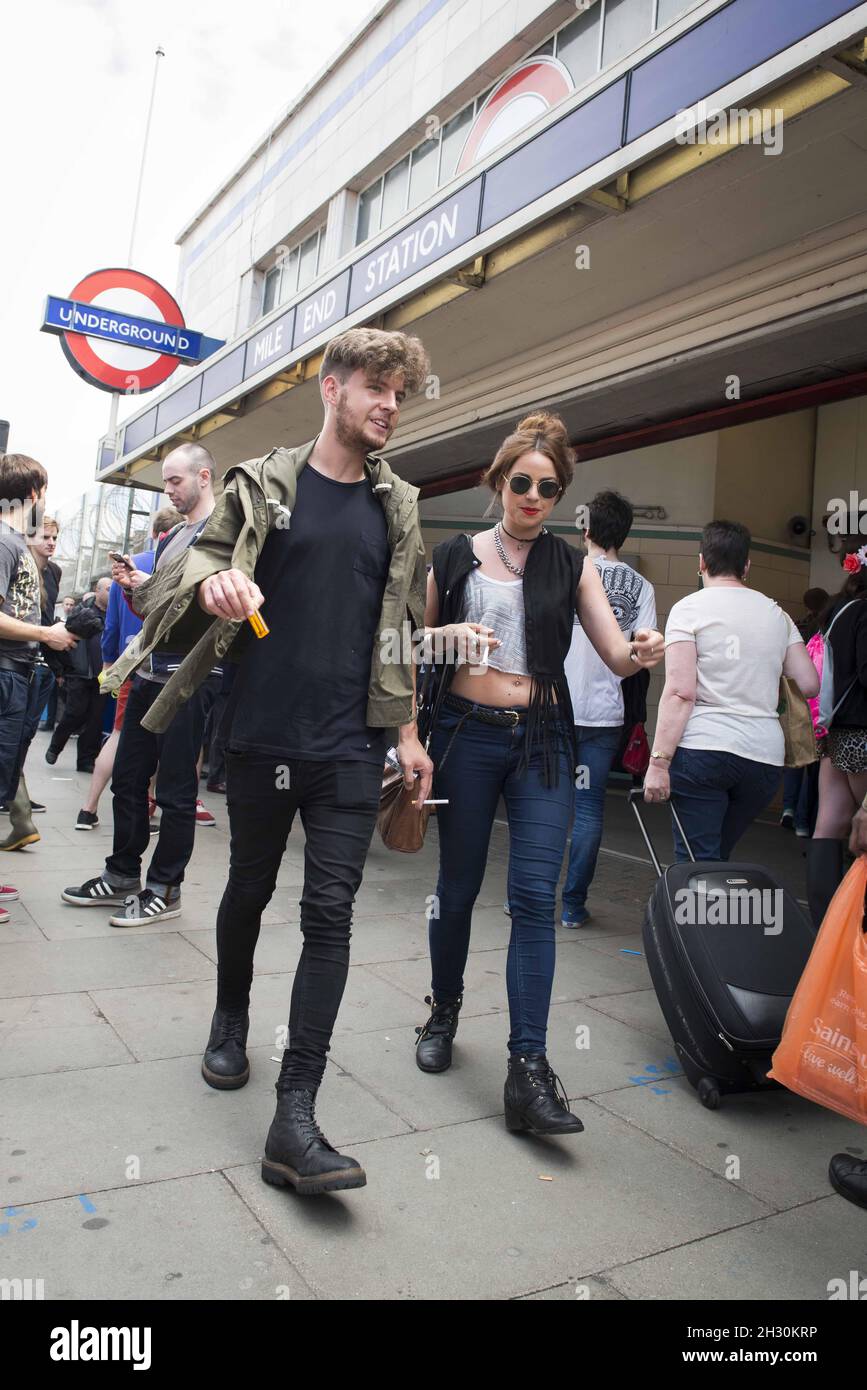 Festival goers arriving at Mile End tube station on day one of Field Day  festival, Victoria Park - London Stock Photo - Alamy