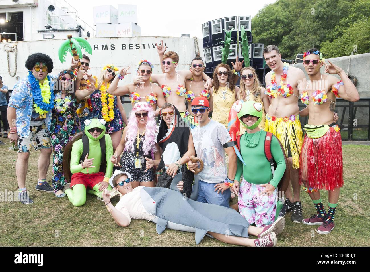 Festival goers in Desert Island Disco themed fancy dress on day 3 of  Bestival 2014, Robin Hill Country Park - Isle of Wight Stock Photo - Alamy