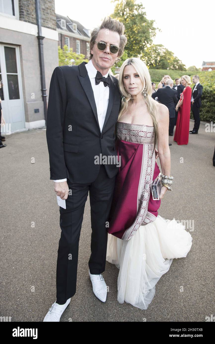 John Taylor and Gela Nash Tayor attend Historic Royal Palaces Summer Party at Kensington Palace - London Stock Photo