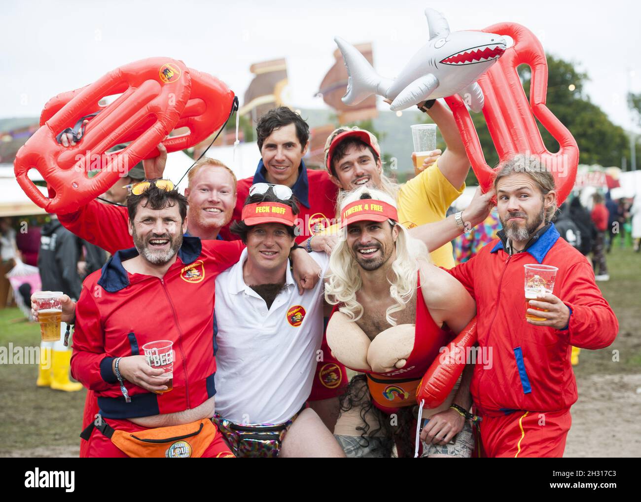 Festival goers in Baywatch fancy dress during Bestival 2017 at Lulworth
