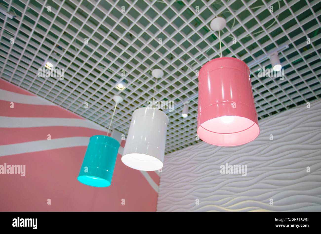 Multi-colored stylish lamps on the ceiling. Stock Photo