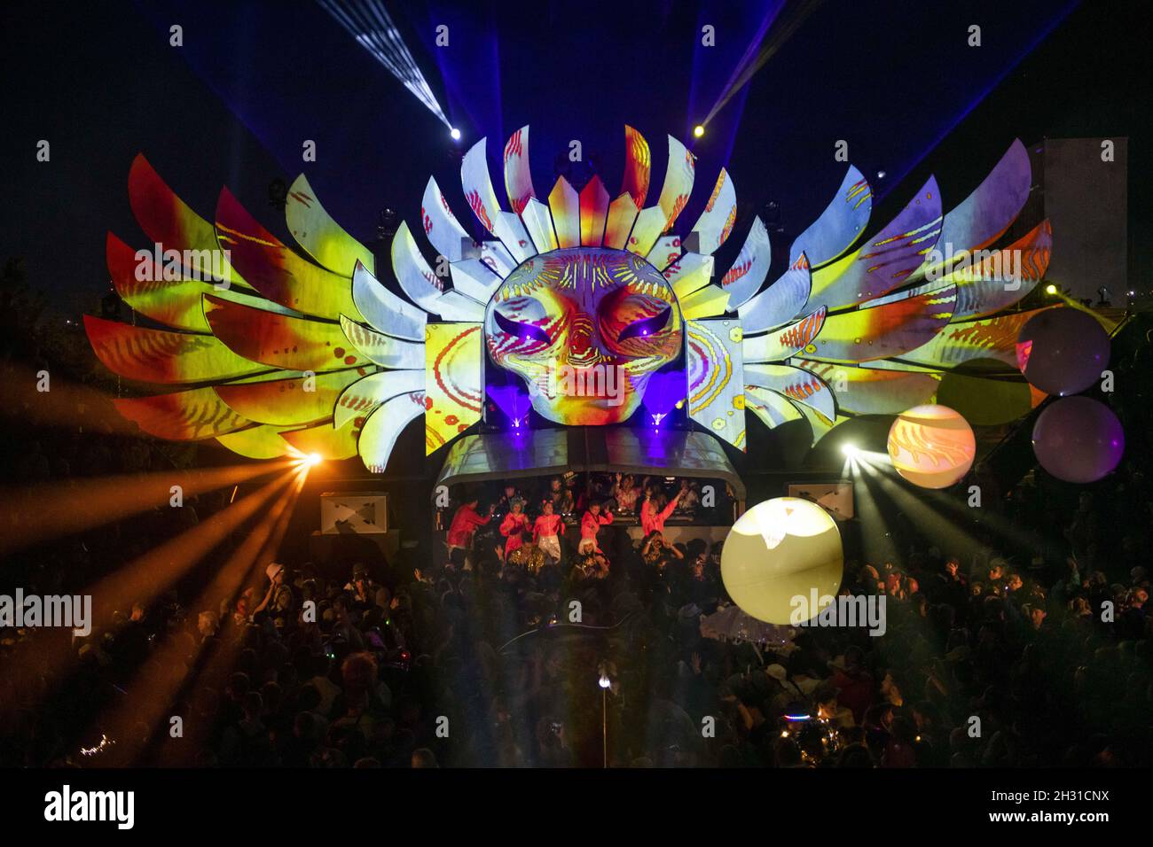 Festival goers dance inside the Temple, an all night venue in the South East corner of Glastonbury at Worthy Farm, Pilton, Somerset. Picture date: Sunday 30th June 2019.  Photo credit should read:  David Jensen/EMPICS Entertainment Stock Photo
