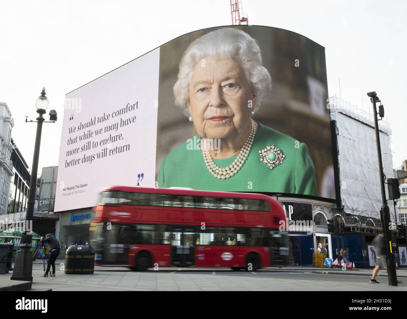 An image of Queen Elizabeth II and quotes from her broadcast on Sunday to  the UK and the Commonwealth in relation to the coronavirus epidemic are  displayed on lights in London's Piccadilly, image size:1300x1018