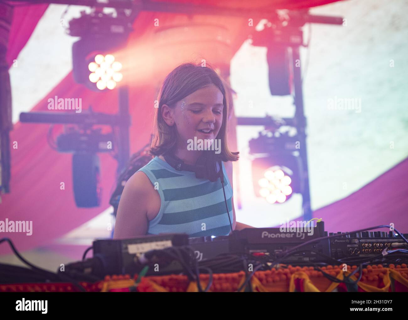 Fat Girl Slim (Nelly Cook) supported by her father Fat Boy Slim (Norman Cook) DJ's on the Bollywood stage at Camp Bestival 2021 at Lulworth Castle - Wareham. Picture date: Saturday 31st July 2021. Photo credit should read: David Jensen/EMPICS Entertainment Stock Photo