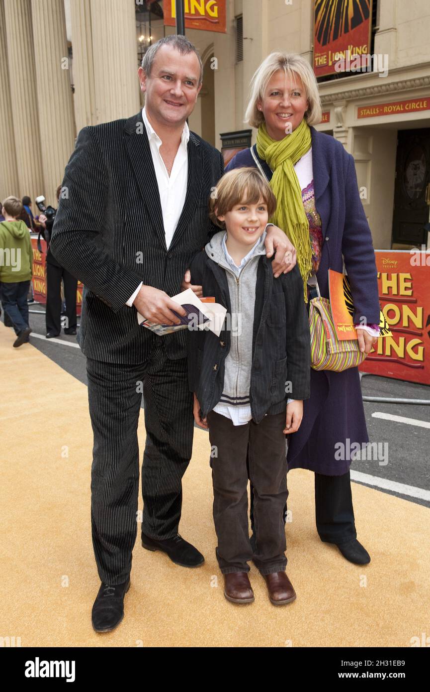 Hugh Bonneville with wife Lulu and son Felix at the 10 Year Anniversary performance of Disney's 'The Lion King' at the Lyceum Theatre, London. Stock Photo