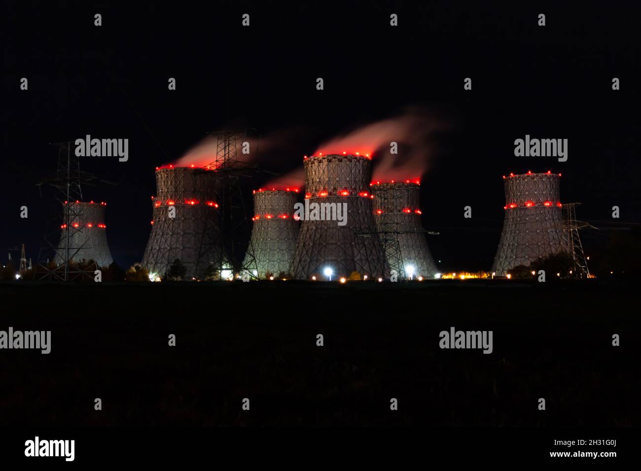 The cooling towers of the nuclear power plant at night Stock Photo - Alamy