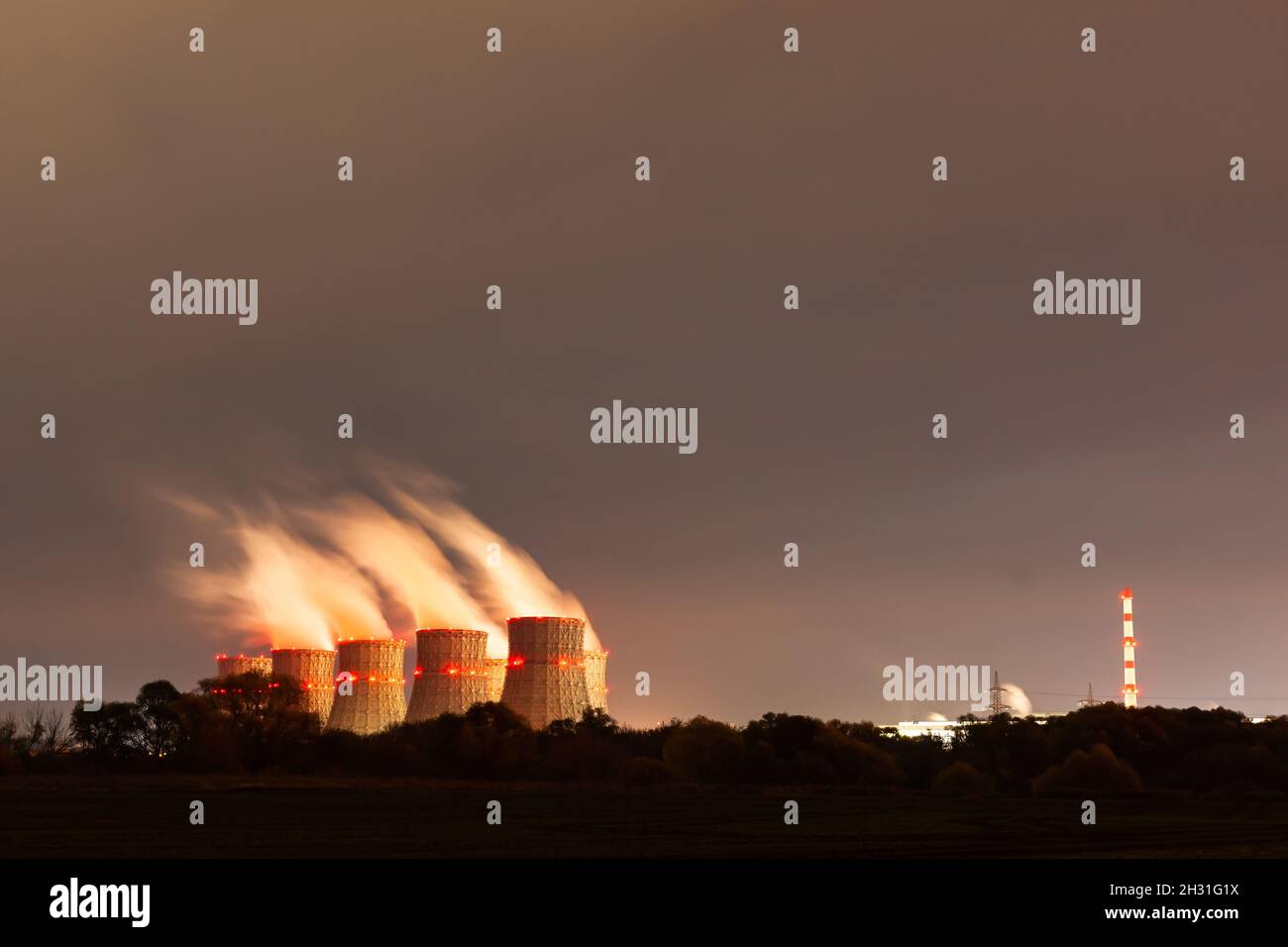 The cooling towers of the nuclear power plant at night Stock Photo - Alamy