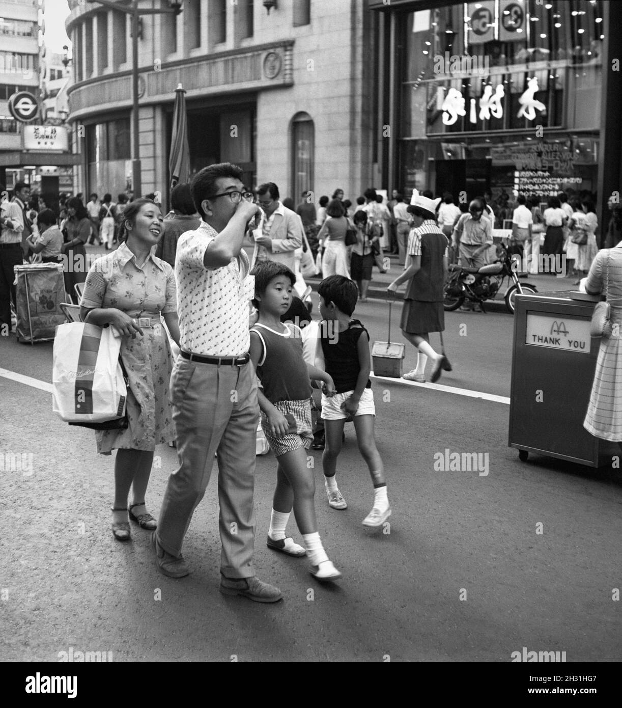 People walk down the street, Tokyo, Japan, September 2, 1978 Stock