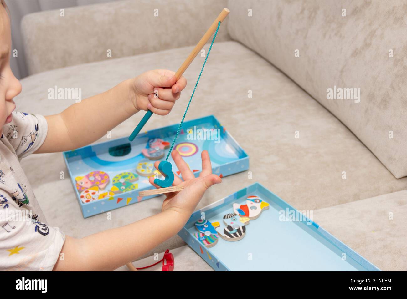 Magnet fishing toy hi-res stock photography and images - Alamy