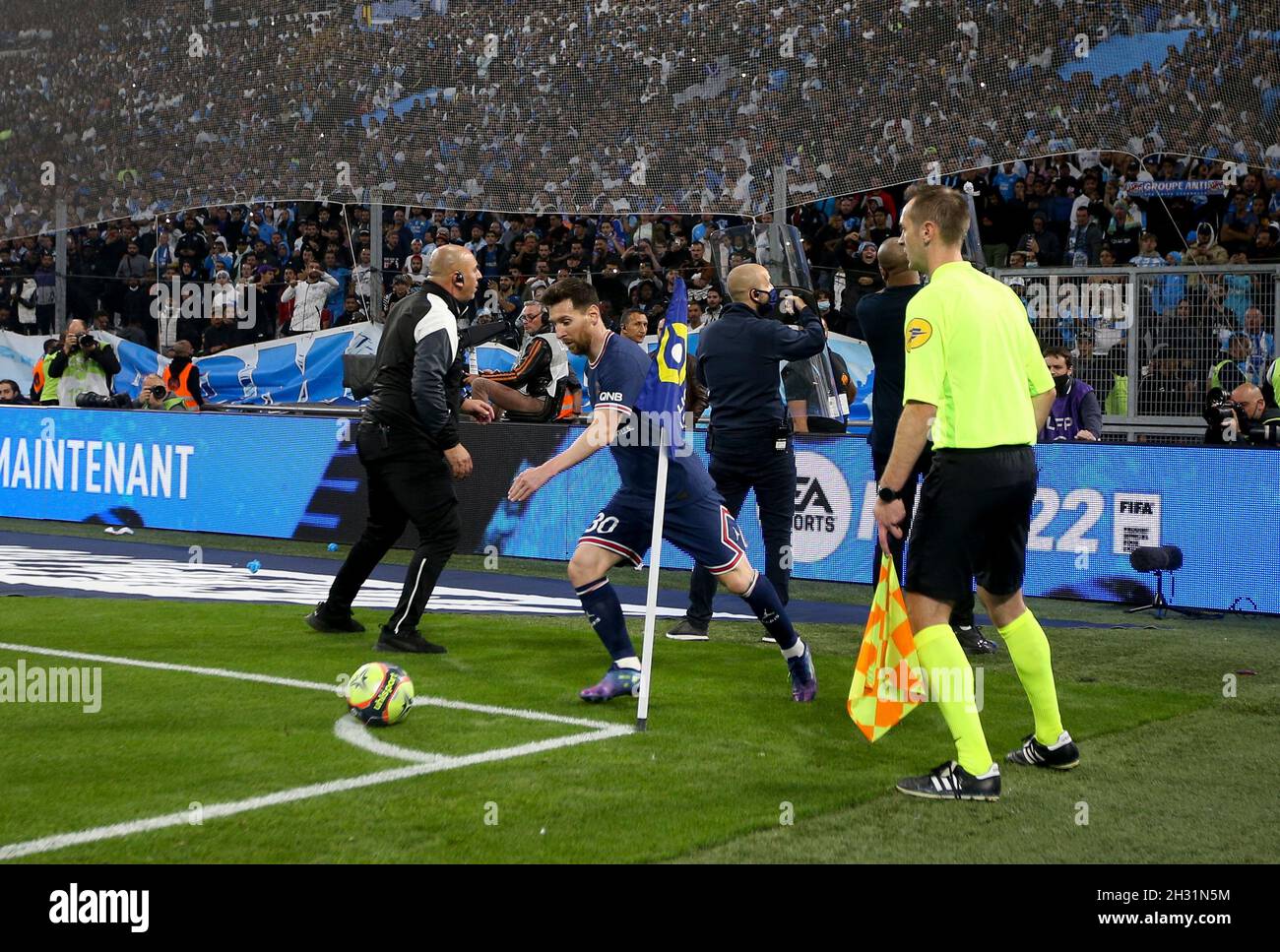 Lionel Messi of PSG is protected by security when shooting corner kicks  during the French championship Ligue 1 football match between Olympique de  Marseille (OM) and Paris Saint-Germain (PSG) on October 24,