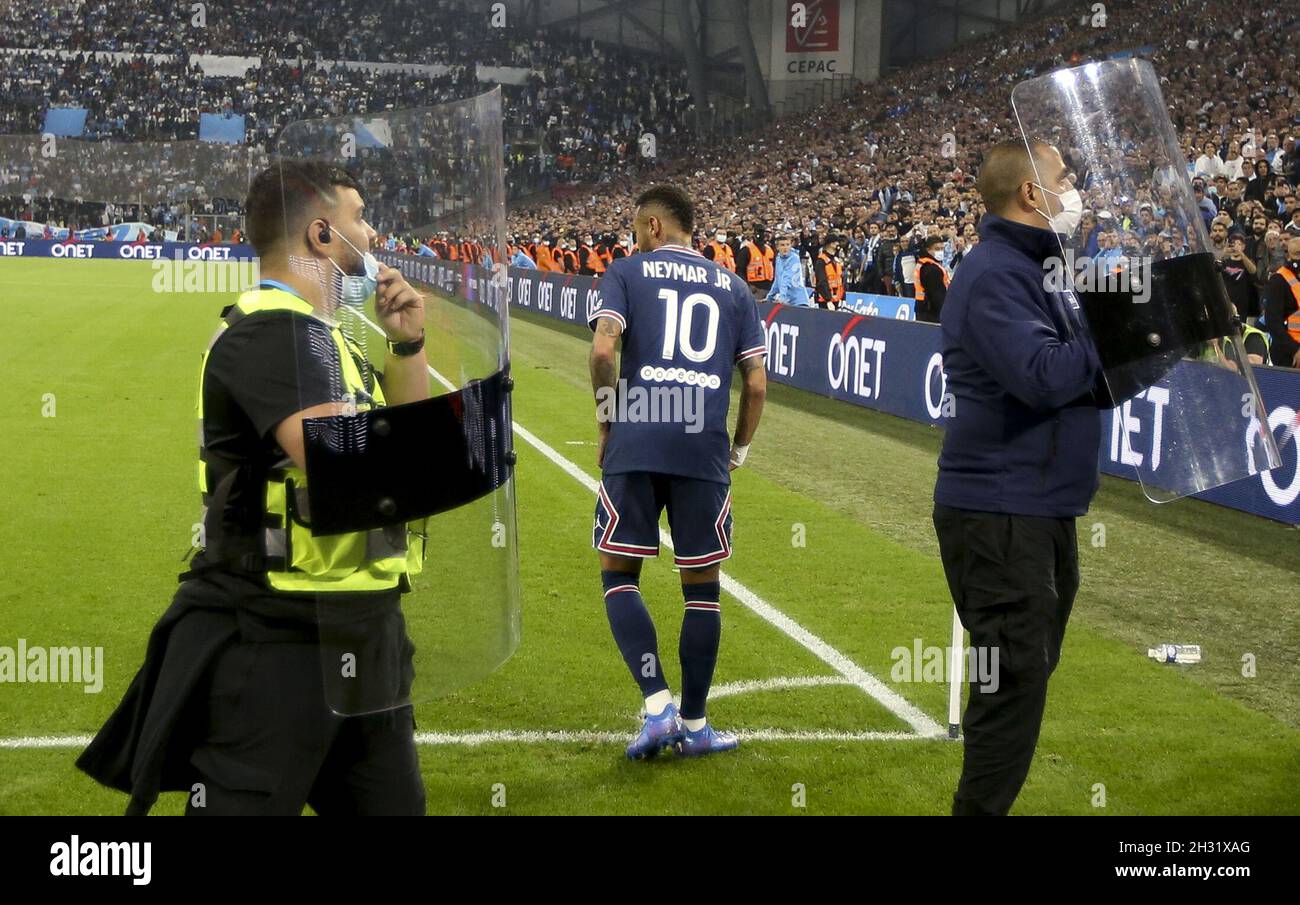 Marseille, France - October 24, 2021, Neymar Jr of PSG is protected by  security forces with shields when shooting corner kicks during the French  championship Ligue 1 football match between Olympique de