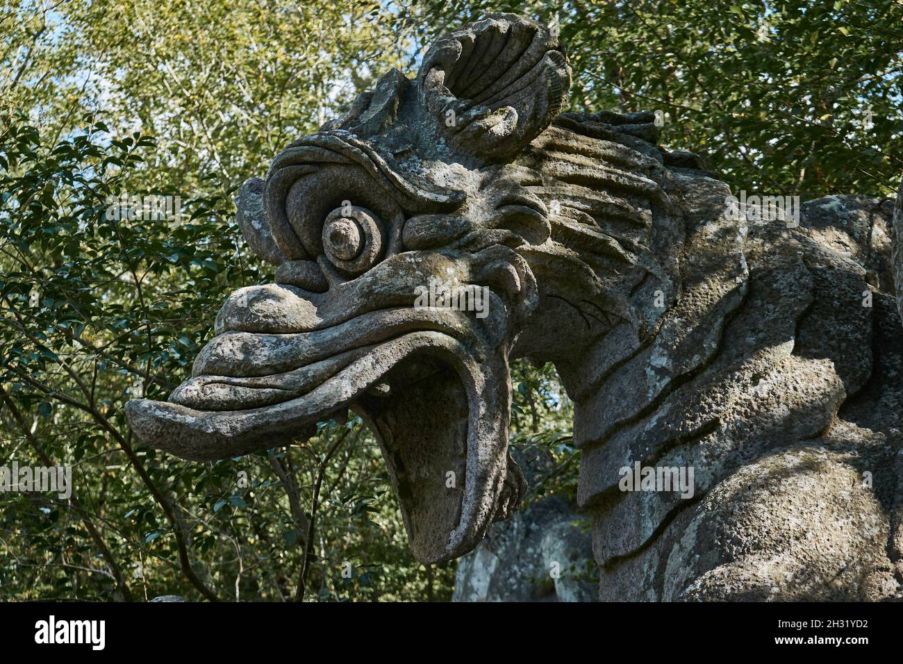 Drache, Steinstatue im Sacro Bosco, Parco dei Mostri, Park der Ungeheuer, Bomarzo, Provinz Viterbo, Latium, Italien, Europa Stock Photo