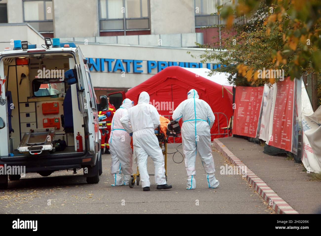 BUCHAREST, ROMANIA - October 24, 2021: An ambulance brings COVID-19 patient at the emergency ward of the biggest hospital in Bucharest, Emergency Univ Stock Photo