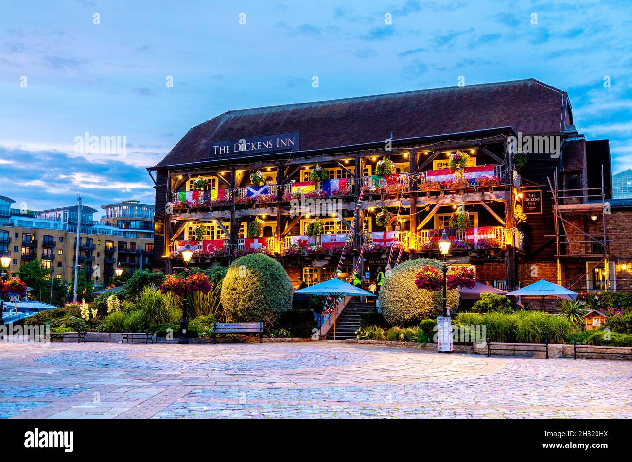 Old 18th century warehouse, now The Dickens Inn pub and restaurant in St Katharine's Docks, London, UK Stock Photo