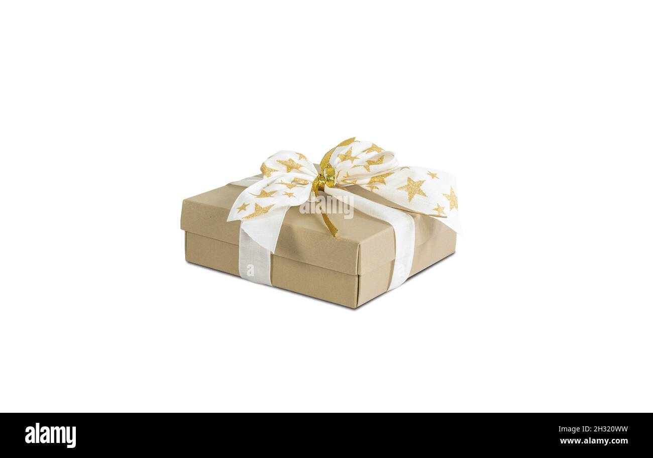 Festive Christmas and New Years present. Golden gift box isolated on white background. Stock Photo