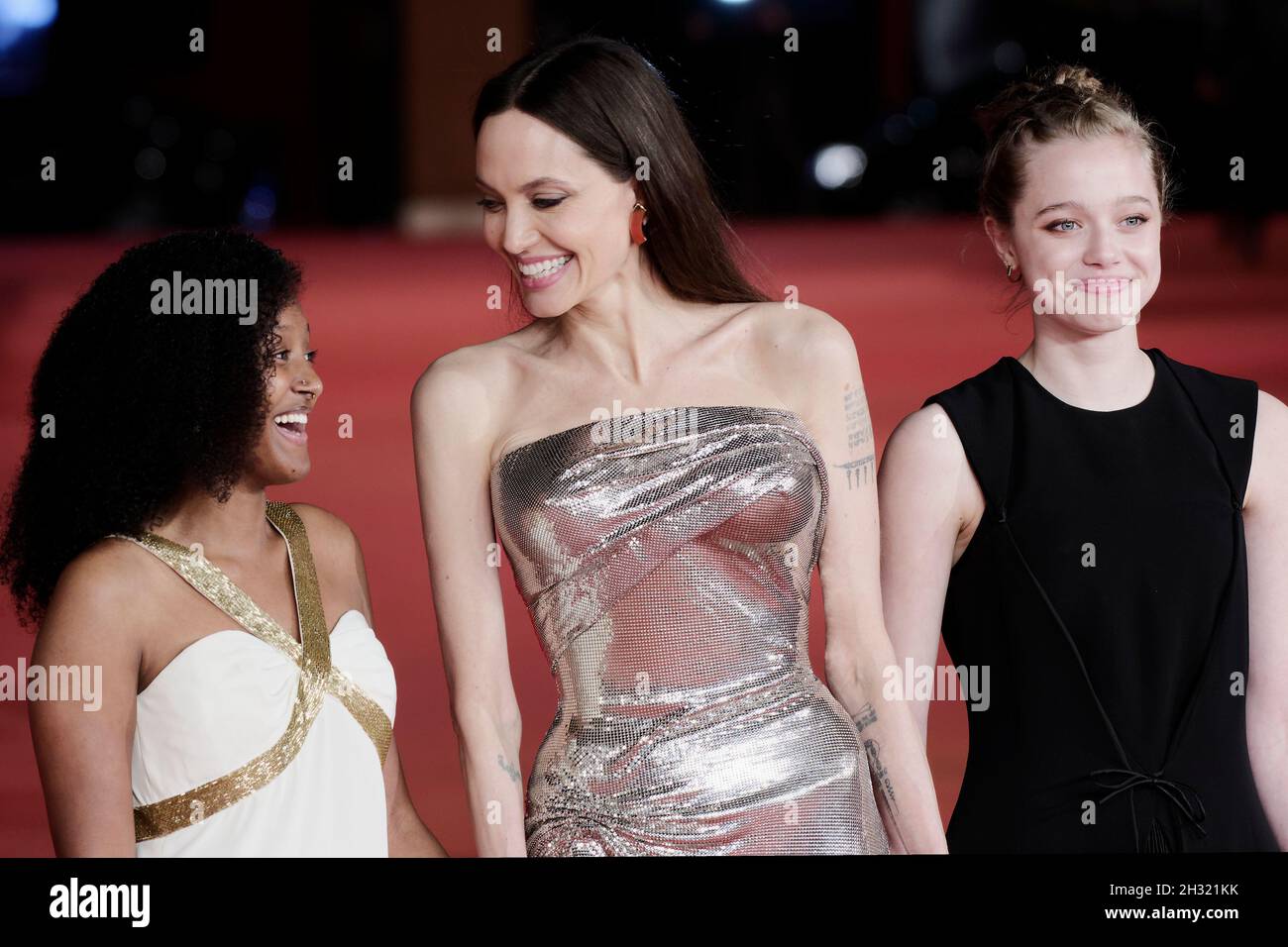 (L-R) Zahara Marley Jolie-Pitt, Angelina Jolie and Shiloh Jolie-Pitt attend the red carpet of the movie 'Eternals' during the 16th Rome Film Fest 2021 Stock Photo