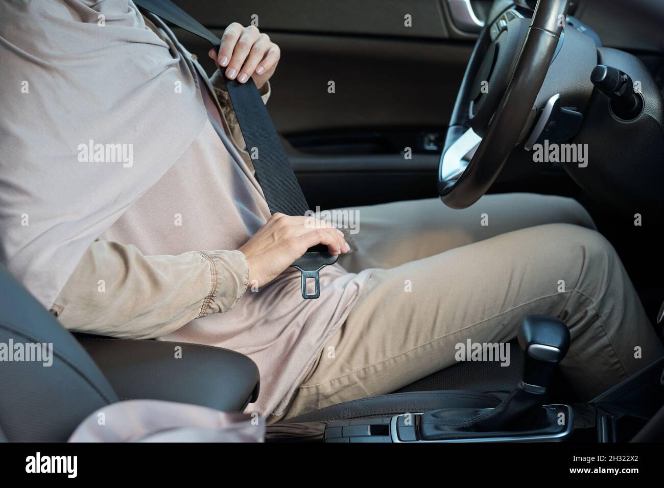 Woman car seatbelt seat belt hi-res stock photography and images - Alamy
