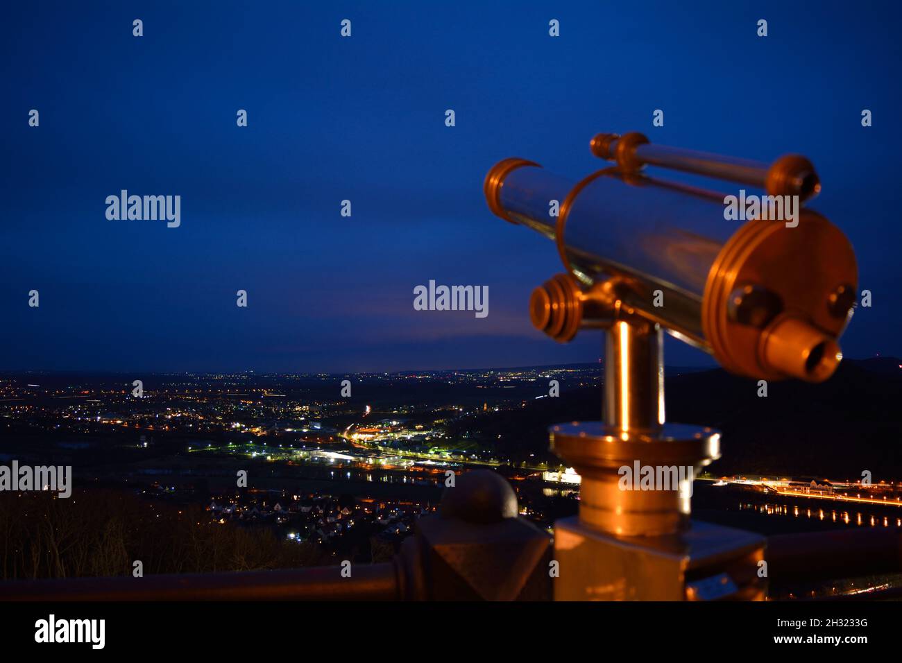 Telescope And City Lights. Stock Photo
