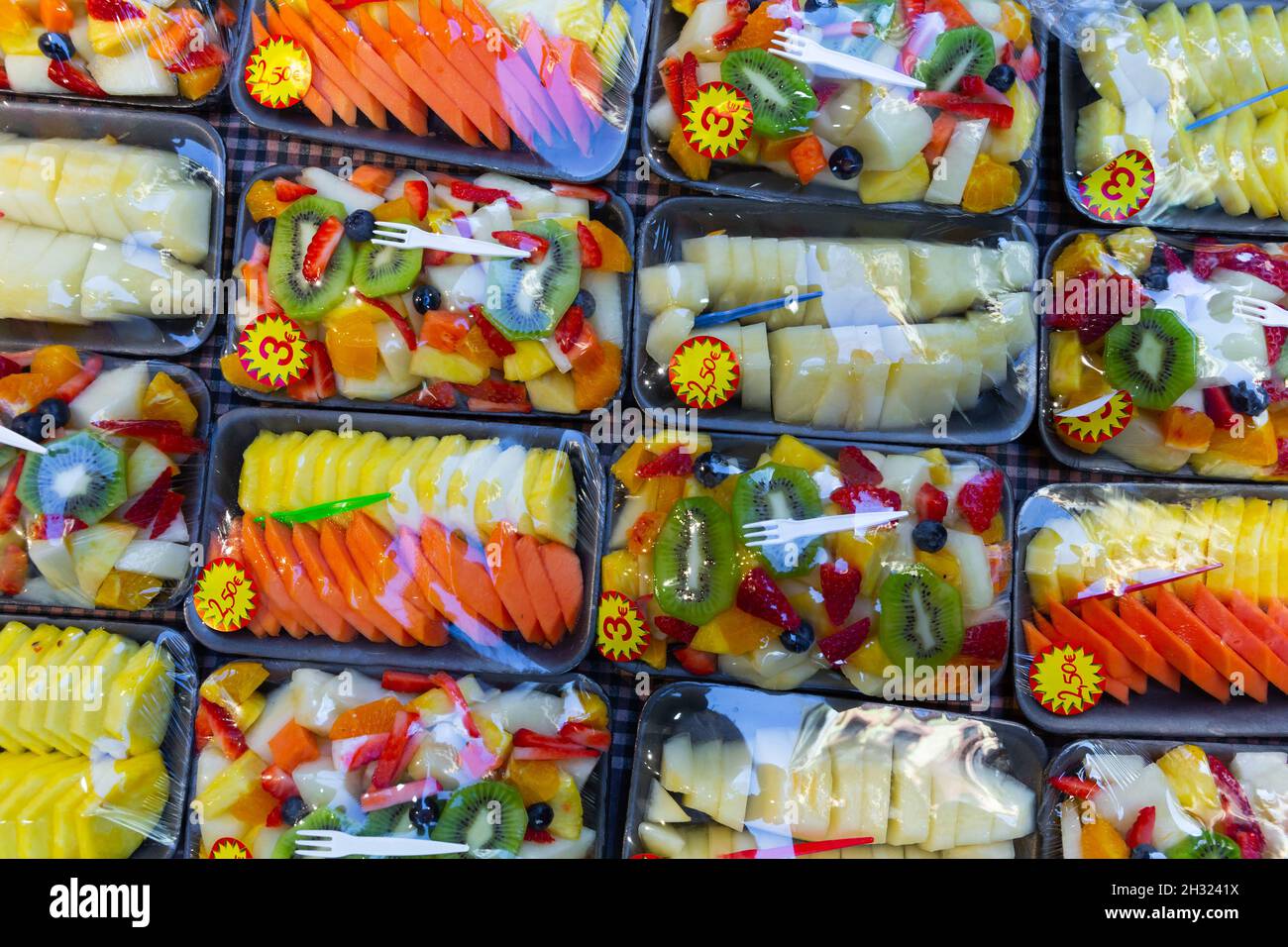 Mix of sliced fruits in plastic package Stock Photo Alamy